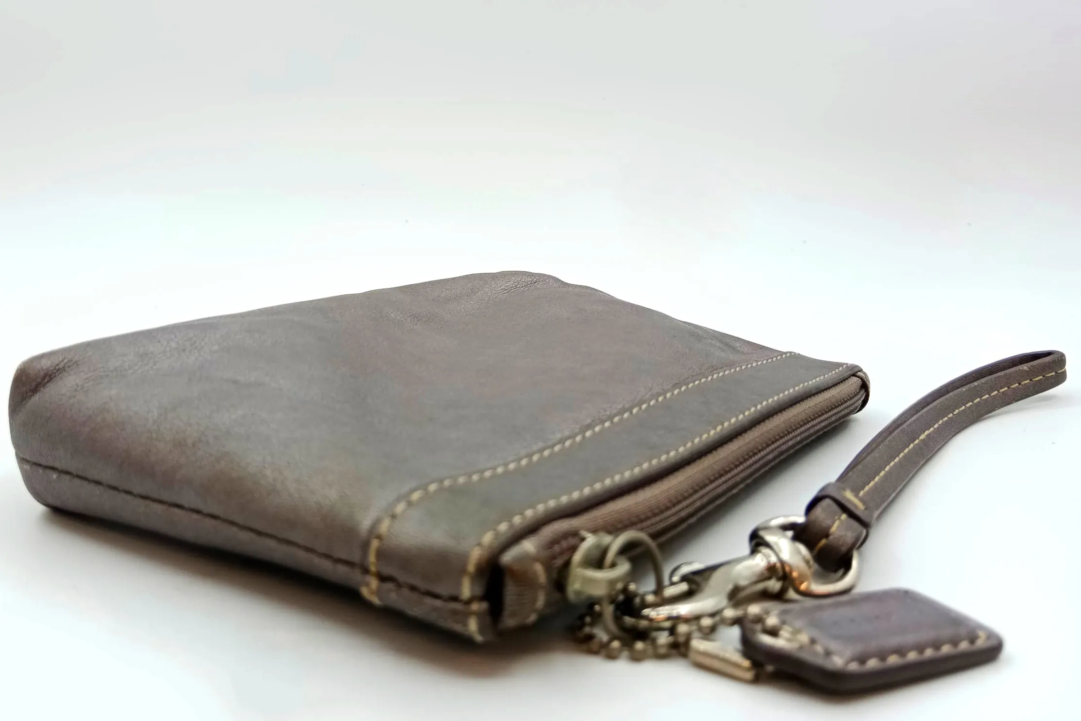 COACH WRISTLET GRAY LEATHER SLIVER HARDWARE