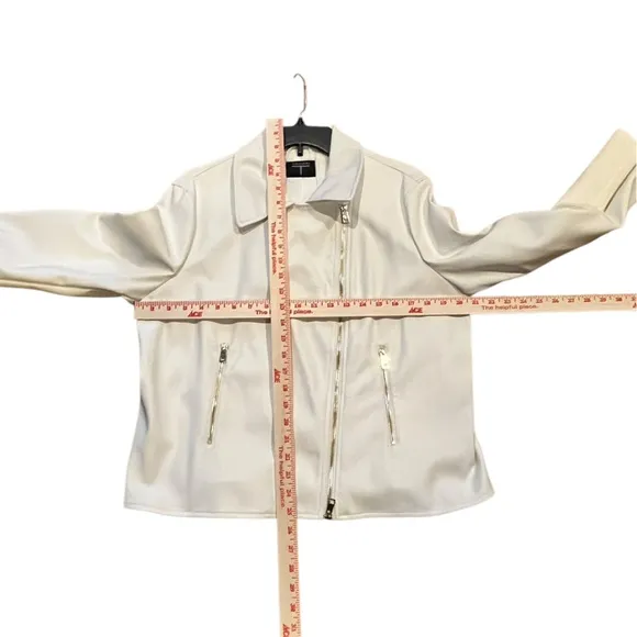 NWOT Tahari faux leather moto jacket with gold tone hardware.