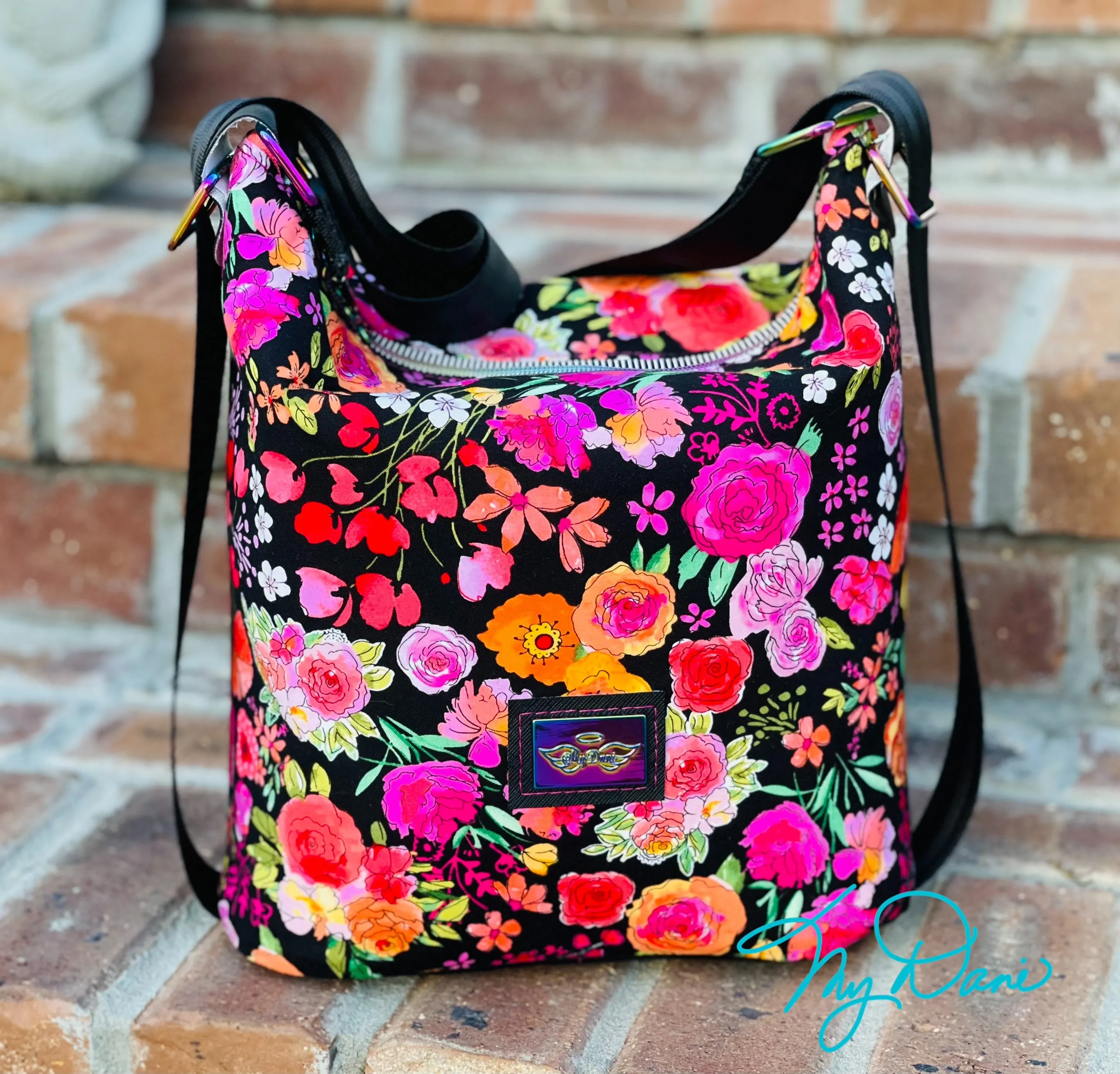 The Krystal Convertible Mini Handbag in Black Floral