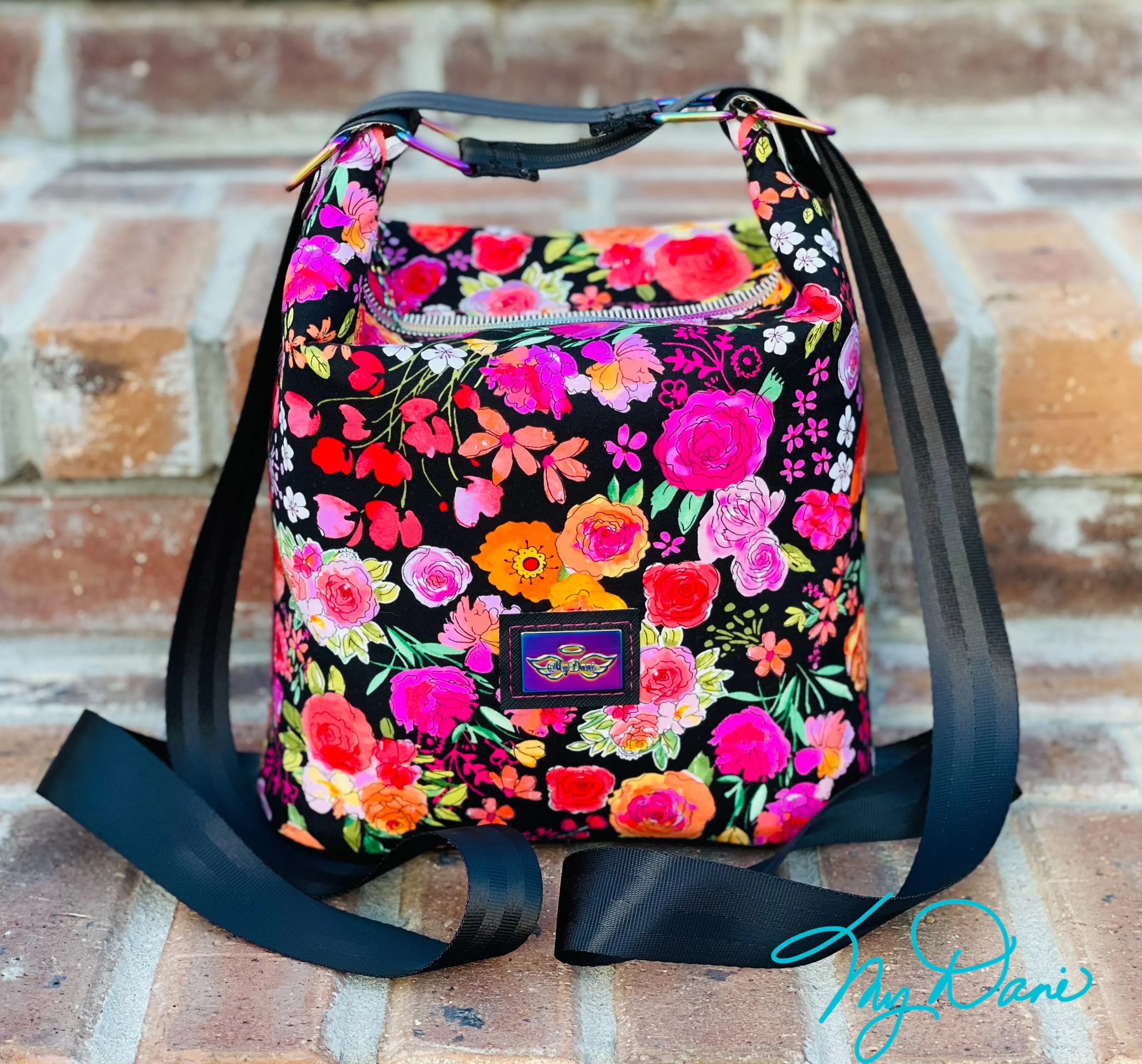 The Krystal Convertible Mini Handbag in Black Floral