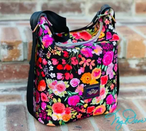 The Krystal Convertible Mini Handbag in Black Floral