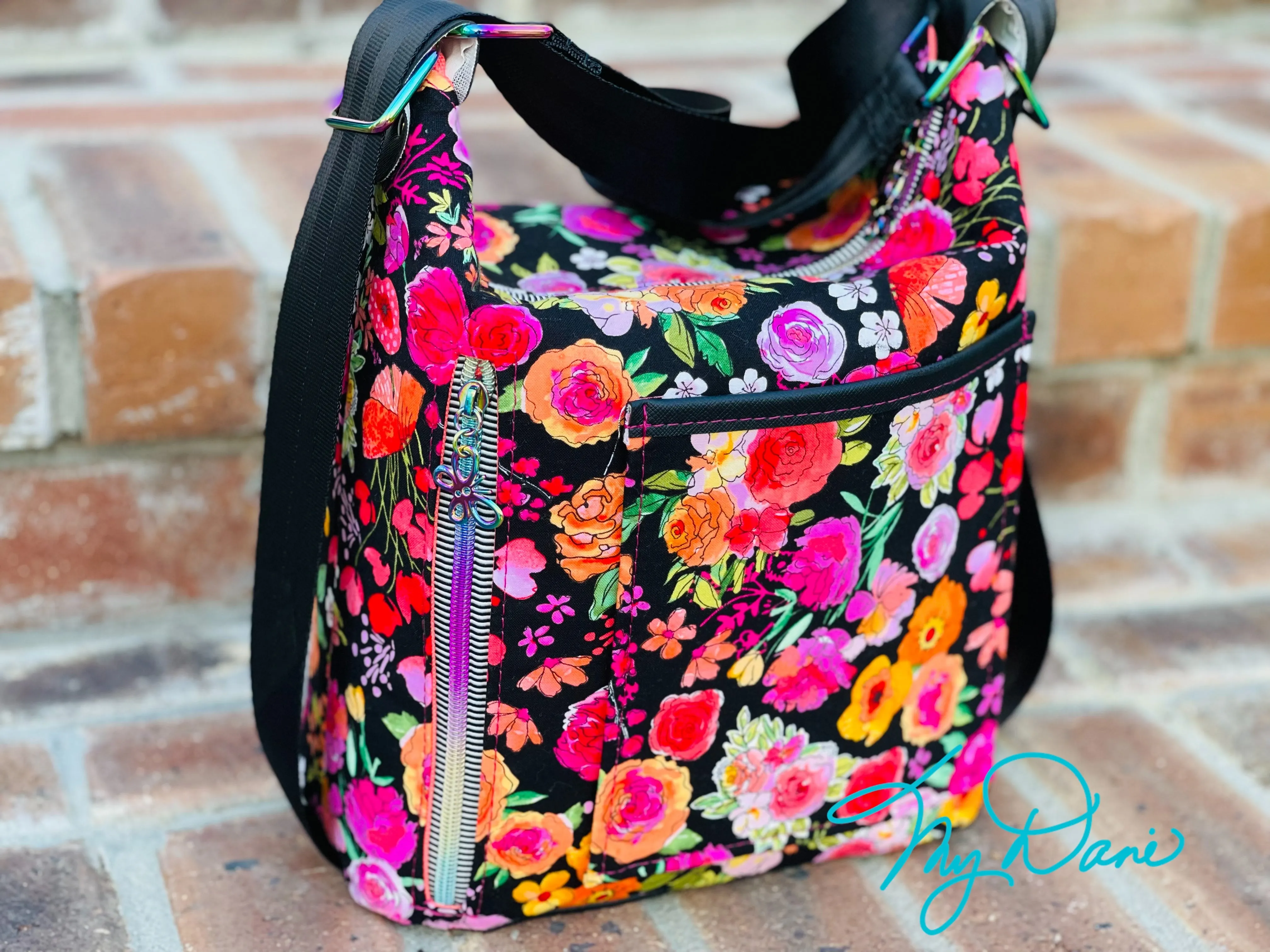 The Krystal Convertible Mini Handbag in Black Floral