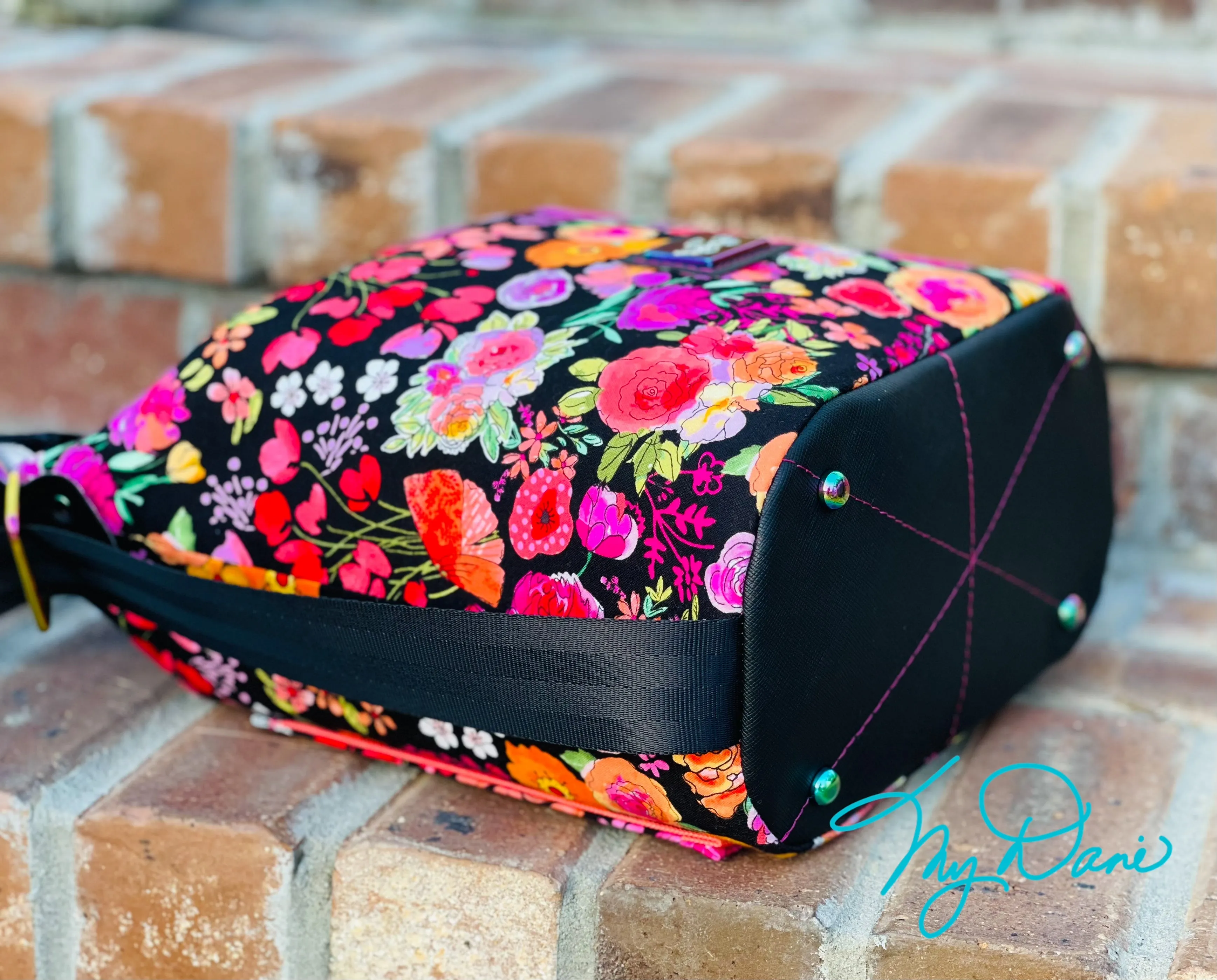 The Krystal Convertible Mini Handbag in Black Floral