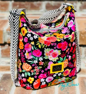 The Mini Krystal Convertible Handbag in Black Floral and Yellow Marine Vinyl