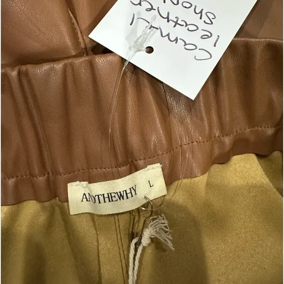 Women’s faux camel leather shorts, NWT!